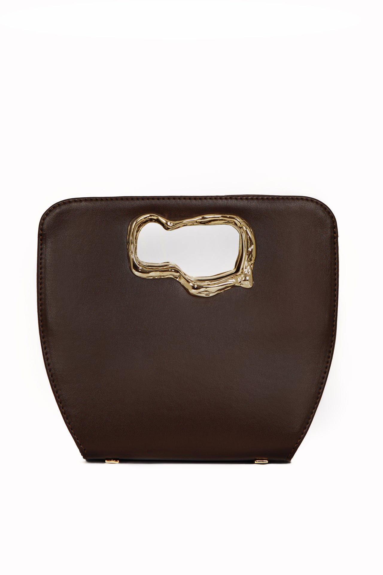 A modern, brown clutch bag with a smooth leather finish and a distinctive gold cutout handle that resembles fluid metalwork.