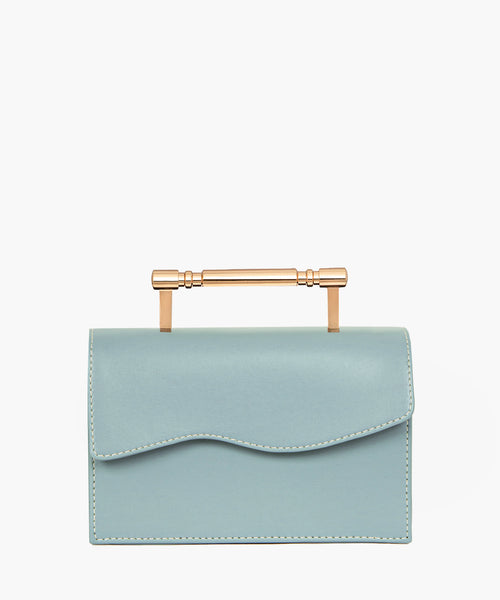 Light blue rectangular handbag with a flap closure and gold-tone bar handle.