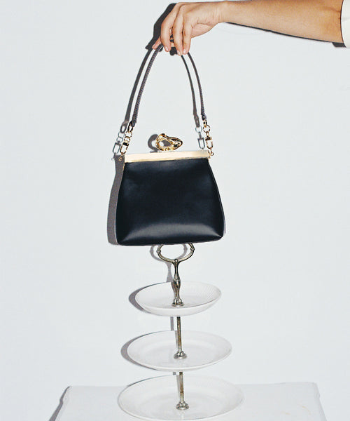 Nicole Black and Gold