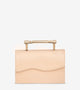 front view of luxury creme structured bag with gold top handle, featuring Mashu's signature wavy design on the front flap