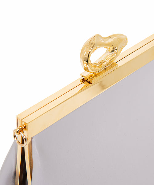 Close-up of the 24ct gold-plated brass hardware on the Nicole Lilac vegan handbag by Mashu, demonstrating high-quality, ethical craftsmanship.