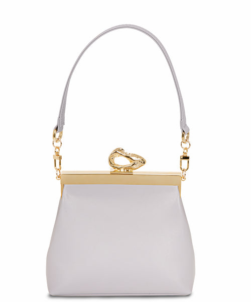 Nicole Lilac vegan handbag by Mashu, featuring a soft lilac hue, sleek structured design, and custom 24ct gold-plated brass hardware, crafted from sustainable vegan leather.