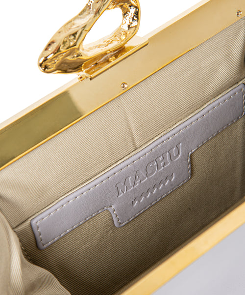 Interior shot of Nicole Lilac vegan handbag by Mashu, featuring a spacious compartment with a sustainable lining and internal pocket for easy organization