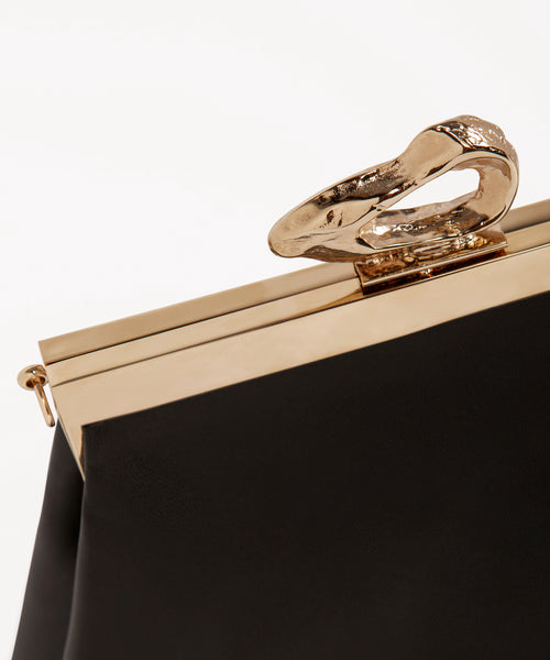 Nicole Black and Gold