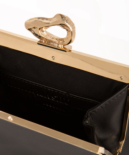 Nicole Black and Gold