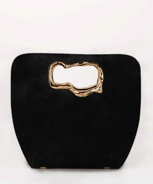 vegan luxury handbag handcrafted with plant based materials.