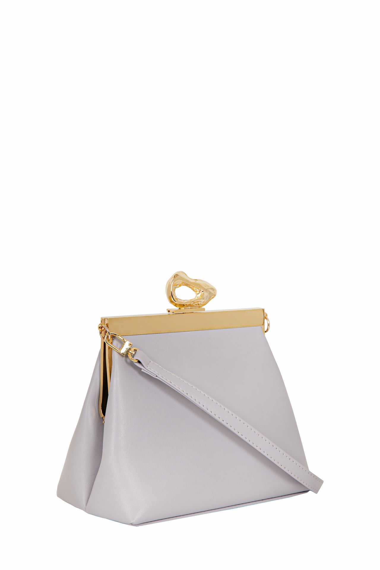 Nicole Lilac vegan handbag by Mashu, featuring a soft lilac hue, sleek structured design, and custom 24ct gold-plated brass hardware, crafted from sustainable vegan leather.