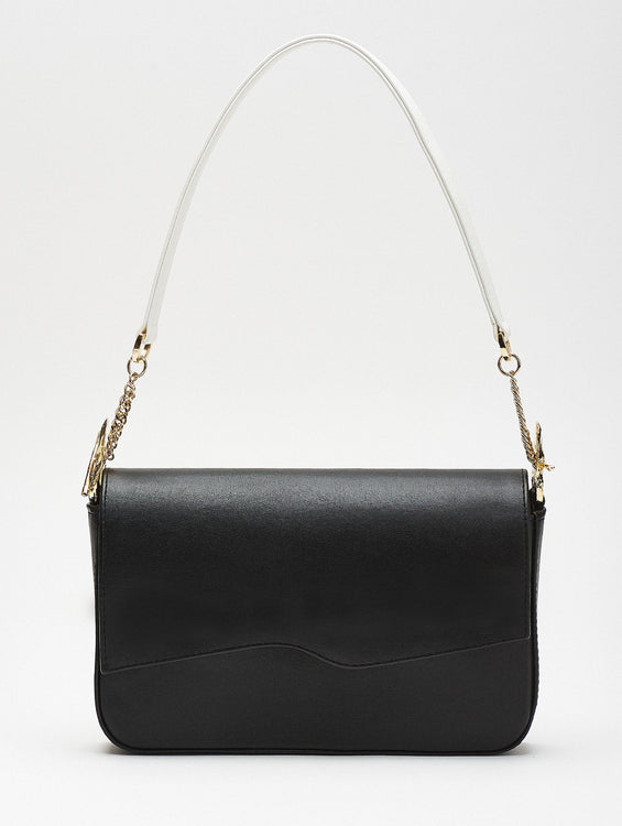 Chic black shoulder bag featuring unique gold hardware and contrasting white handles, blending modern elegance with timeless sophistication.