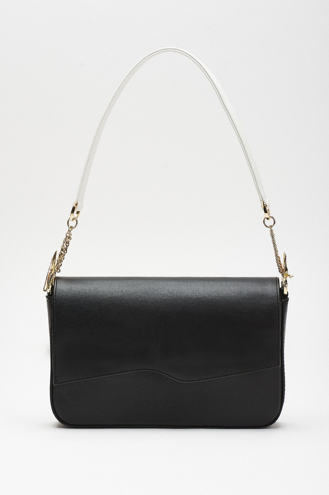 Chic black shoulder bag featuring unique gold hardware and contrasting white handles, blending modern elegance with timeless sophistication.